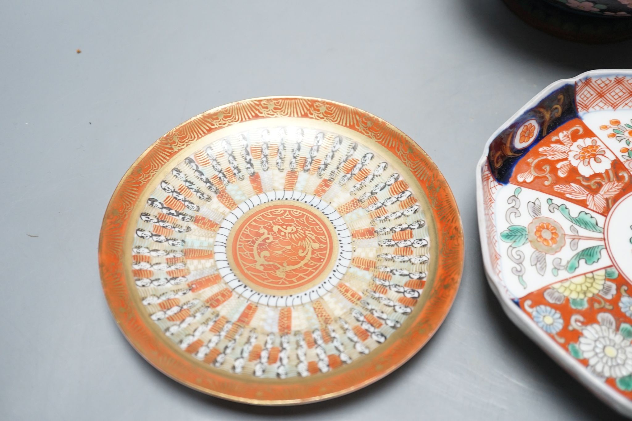 Two Japanese Satsuma pottery saucers, three Kutani saucers, and Imari dish and a Japanese cloisonné enamel koro and cover